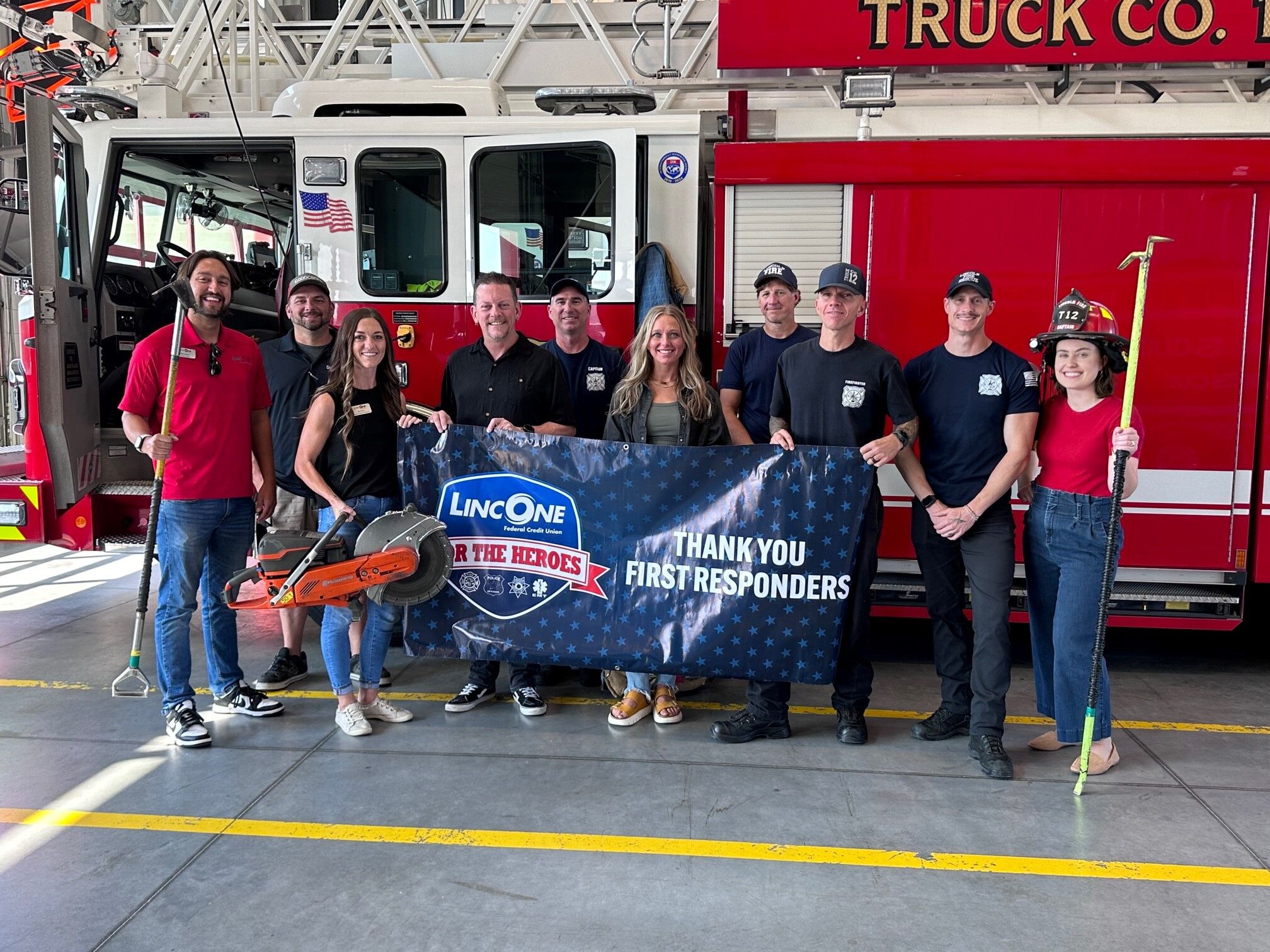 LincOne for the heroes event raising awareness for first responders, image in front of firetruck